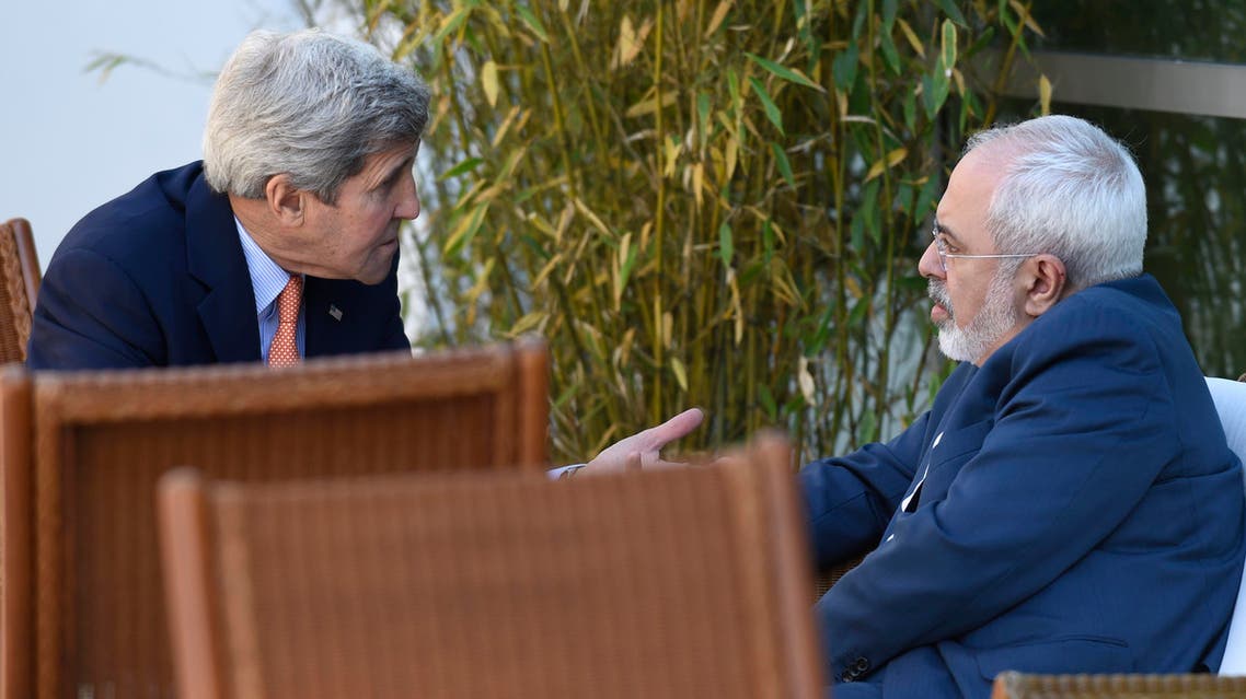U.S. Secretary of State John Kerry, left, talks with Iranian Foreign Minister Mohammad Javad Zarif, in Geneva, Switzerland, Saturday, May 30, 2015. AP
