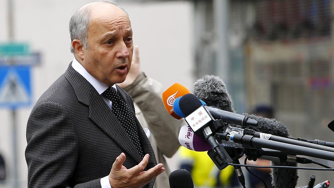 French Foreign Minister Laurent Fabius talks to journalists upon his arrival to attend the nuclear talks between Tehran and six world powers in Vienna, Austria, June 27, 2015. (Reuters)