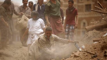 People search for survivors under the rubble of houses destroyed by Saudi airstrikes in the old city of Sanaa, Yemen, Friday, June 12, 2015. (Reuters)