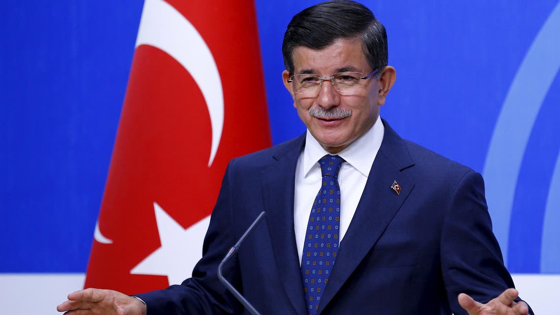 Turkey's Prime Minister Ahmet Davutoglu speaks during a news conference at his ruling AK Party (AKP) headquarters in Ankara, Turkey, June 26, 2015. REUTERS/Umit Bektas