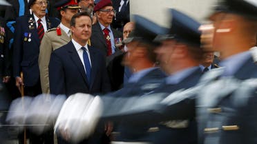 British Prime Minister David Cameron attends the Armed Forces Day in Guildford. (Reuters)