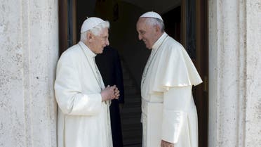 Pope Francis (R) talks with Pope Emeritus Benedict XVI during a meeting at the Vatican June 30, 2015. REUTERS/Osservatore Romano  ATTENTION EDITORS - THIS PICTURE WAS PROVIDED BY A THIRD PARTY. REUTERS IS UNABLE TO INDEPENDENTLY VERIFY THE AUTHENTICITY, CONTENT, LOCATION OR DATE OF THIS IMAGE. NO SALES. NO ARCHIVES. FOR EDITORIAL USE ONLY. NOT FOR SALE FOR MARKETING OR ADVERTISING CAMPAIGNS. THIS PICTURE IS DISTRIBUTED EXACTLY AS RECEIVED BY REUTERS, AS A SERVICE TO CLIENTS. NO COMMERCIAL USE.