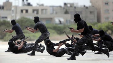 Palestinian Hamas security forces display their military skills during a police academy graduation ceremony in Gaza City, Thursday, May 21, 2015. (AP)
