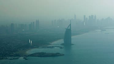 With Burj Al Arab, the luxury hotel in front, the Marina high rises are seen in the background from the plane in Dubai, United Arab Emirates. (AP)