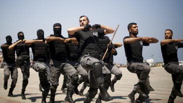 Palestinian policemen loyal to Hamas demonstrate their skills during a military graduation ceremony in Gaza City June 16, 2015.  (Reuters)