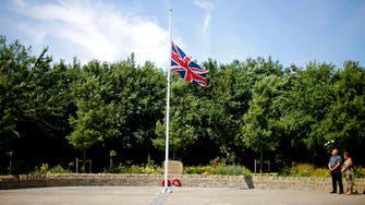 Britain falls silent to remember 30 killed in Tunisian gun attack