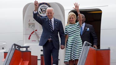 U.S. Vice President Joe Biden, left, and his wife Jill Biden wave as they arrive to an air force base in Guatemala City, Monday, March 2, 2015. (AP)
