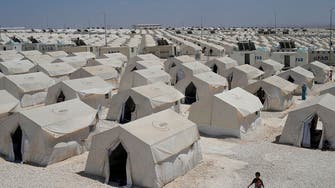 Cash-strapped U.N. food agency reduces help to Syrian refugees