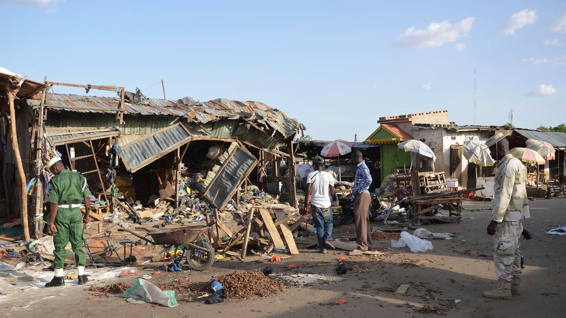 People gather at the site of a suicide bomb attack at a market in Maiduguri, Nigeria on June, 22, 2015. (File Photo: AP)