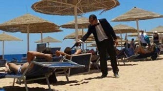 In grisly gag, Egypt hotel entertainer points toy gun at British tourists