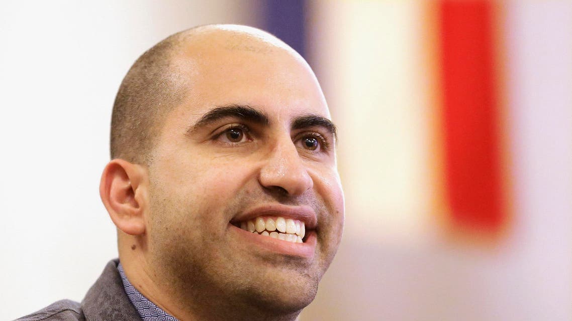 Steve Salaita, a professor who lost a job offer from the University of Illinois over dozens of profane, anti-Israel Twitter messages, speaks during a news conference in Champaign Ill. AP
