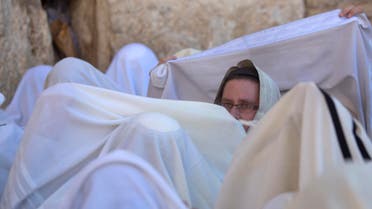 Covered in prayer shawls, Israeli ultra-orthodox Jewish men of the Cohanim Priestly caste participate in a blessing during the Jewish holiday of Passover. (File: AP)