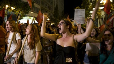 "No" supporters celebrate referendum results on a street in central in Athens, Greece July 5, 2015. (Reuters)