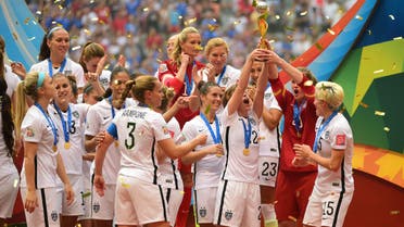 United States players react as they receive the FIFA Women's World Cup trophy after defeating Japan. (Reuters)