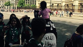 Man parades ISIS flag with toddler in streets of London