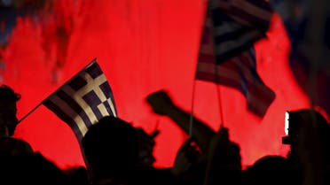 "No" supporters wave Greek national flags on the main Constitution (Syntagma) square in Athens, Greece. (Reuters)