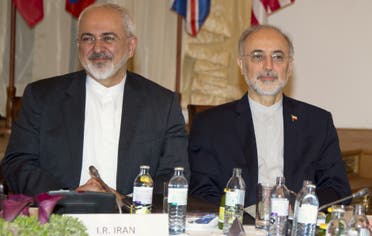 Iranian Foreign Minister Mohammad Javad Zarif (L) and the Head of the Iranian Atomic Energy Organization Ali Akbar Salehi attend Iran nuclear talks meetings in Vienna, Austria on July 6, 2015. (AFP)