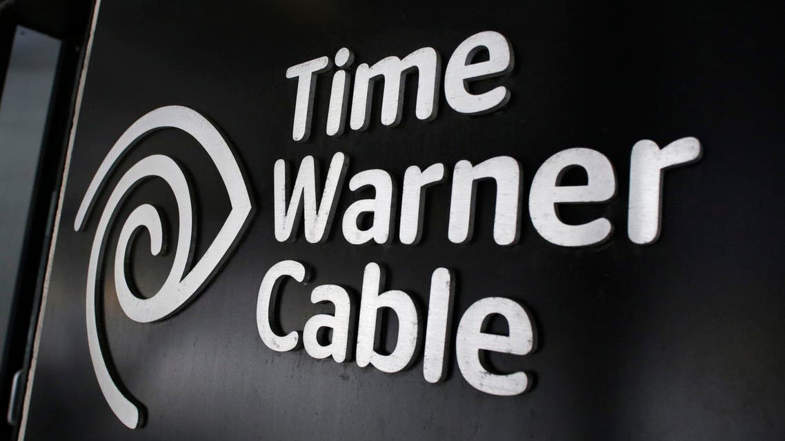The Time Warner Cable corporate logo is displayed at a company store, Tuesday, May 26, 2015 in New York. Charter Communications is buying Time Warner Cable for $55.33 billion. AP