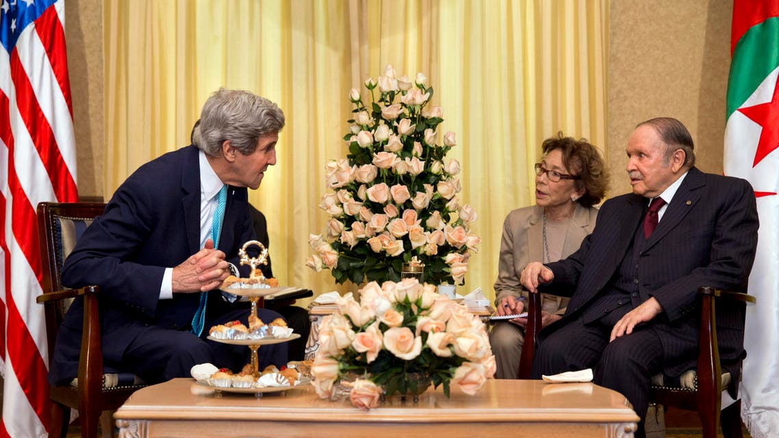 U.S. Secretary of State John Kerry leans in to hear what Algerian President Abdelaziz Bouteflika, right, is saying during their meeting in Zeralda outside of Algiers, Algeria, Thursday, April 3, 2014. (AP)