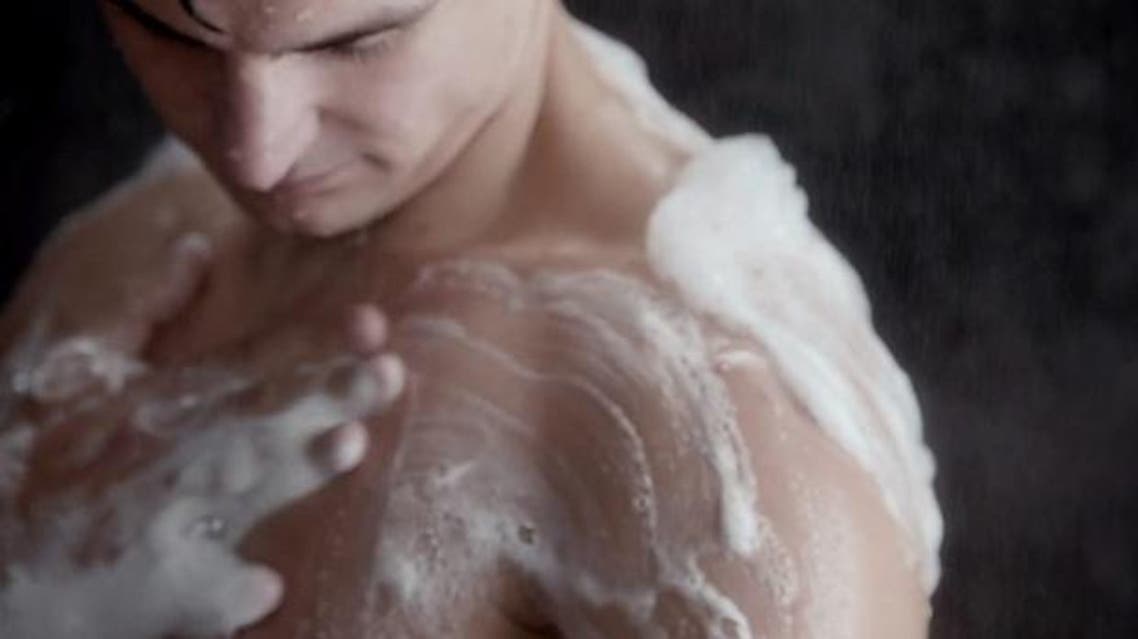 Johnny Mercer, a former army captain, takes a shower in the advert for Dove. Photograph: Dove. (Photo Courtesy The Gaurdian)