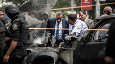Security personnel investigate the site of a bombing that killed Egypt’s top prosecutor, Hisham Barakat, in Cairo, Egypt, Monday, June 29, 2015. AP