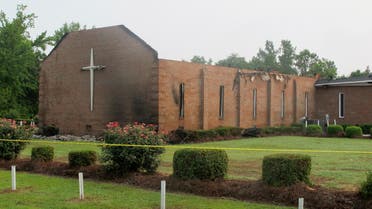 The Mount Zion AME Church in Greeleyville, S.C., is seen on Wednesday, July 1, 2015, after it was heavily damaged by fire. The church was the target of arson by the Ku Klux Klan two decades ago but a law enforcement source told The Associated Press that the most recent fire was not arson. (AP Photo/Bruce Smith)