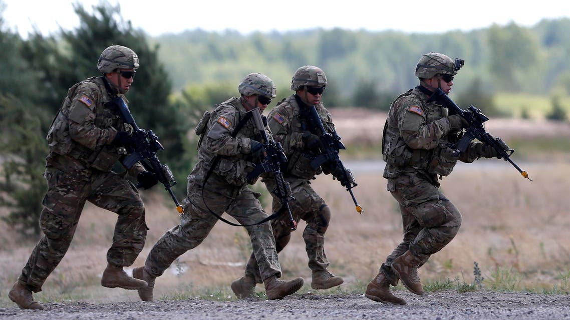 Members of the U.S. Army 173rd Airborne Brigade practice during the combined Lithuanian-U.S. training exercise at the Gaiziunai Training Area some 110 kms (69 miles) west of the capital Vilnius Lithuania, Tuesday, July 7, 2015. AP