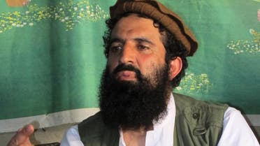 In this Saturday, Oct. 5, 2013 file photo, Pakistani Taliban spokesman Shahidullah talks to reporters at an undisclosed location in Pakistani tribal area of Waziristan along Afghanistan border. The Pakistani Taliban announced Saturday that the group will observe a one-month cease-fire as part of efforts to negotiate a peace deal with the government, throwing new life into a foundering peace process. Spokesman Shahidullah Shahid said in a statement emailed to reporters that the top leadership of the militant group has instructed all of its units to comply with the cease-fire. (AP Photo/Ishtiaq Mahsud, File)
