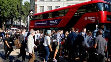 Commuters queue for buses as tube drivers are on strike in London, Thursday, July 9, 2015. Drivers and station staff were walking out for 24 hours from 6:30 p.m. (1730GMT) Wednesday in a dispute over pay and schedules when a 24-hour subway service starts on some lines later this year.The Underground handles 4 million journeys a day, and the strike by members of four unions will likely paralyze the capital's transport system, despite extra bus and river services. (AP Photo/Frank Augstein)
