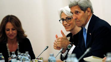 U.S. Secretary of State John Kerry and U.S. Under Secretary for Political Affairs Wendy Sherman, centre, meet with foreign ministers and representatives of Germany, France, China, Britain, Russia and the European Union during the current round of nuclear talks with Iran, being held in Vienna, Austria July 10, 2015. U.S. Secretary of State John Kerry urged Iran to make the “tough political decisions” needed to reach an agreement but Iranian Foreign Minister Mohammad Javad Zarif accused major powers on Friday of backtracking on previous pledges and throwing up new "red lines" at nuclear talks. (Carlos Barria/Pool via AP)