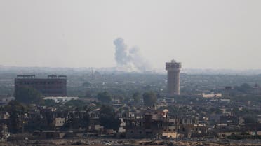 Smoke rises in Egypt's North Sinai as seen from the border of southern Gaza Strip with Egypt July 1, 2015. Islamic State militants launched a wide-scale coordinated assault on several military checkpoints in Egypt's North Sinai on Wednesday in which 50 people were killed, security sources said, the largest attack yet in the insurgency-hit province. REUTERS/Ibraheem Abu Mustafa TPX IMAGES OF THE DAY