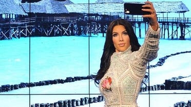 Kim kardashian,selfie-taking lifesize waxwork in Madame Tussauds. (Daily Mail)
