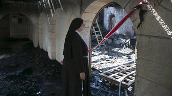 Israel arrests three suspected of links to attack on historic church