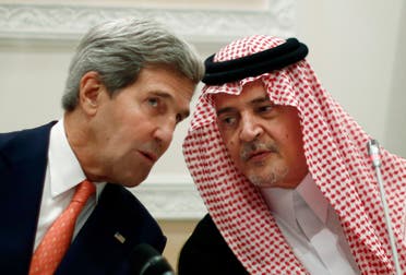 U.S. Secretary of State John Kerry, left, speaks with the late Saudi Arabia’s Foreign Minister Prince Saud al-Faisal in Riyadh. (AP)