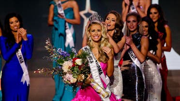 Miss Oklahoma Olivia Jordan is crowned Miss USA by Miss USA 2014 Nia Sanchez during the 2015 Miss USA pageant in Baton Rouge, La., Sunday, July 12, 2015. (AP)
