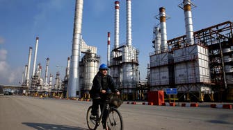 Oil tumbles as Iran nuclear deal looms