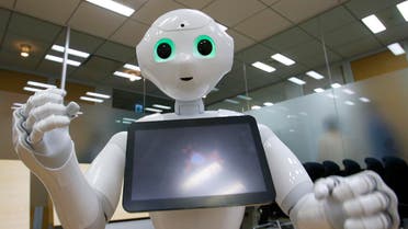 SoftBank Corp.'s new companion robot Pepper performs during an interview at the technology company's headquarters in Tokyo. (AP)