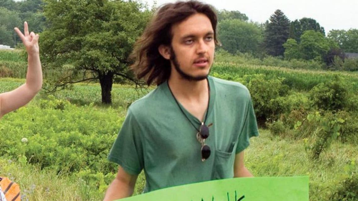 In this July 26, 2012 photo provided by the Northumberland News, Alexander Ciccolo participates in a peace walk through Brighton, Ontario. (AP)