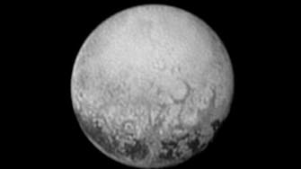 Little Pluto bigger than scientists thought as flyby looms 