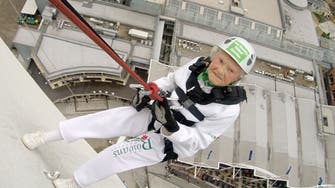 Showing no fear, 101-year-old woman abseils from tower 