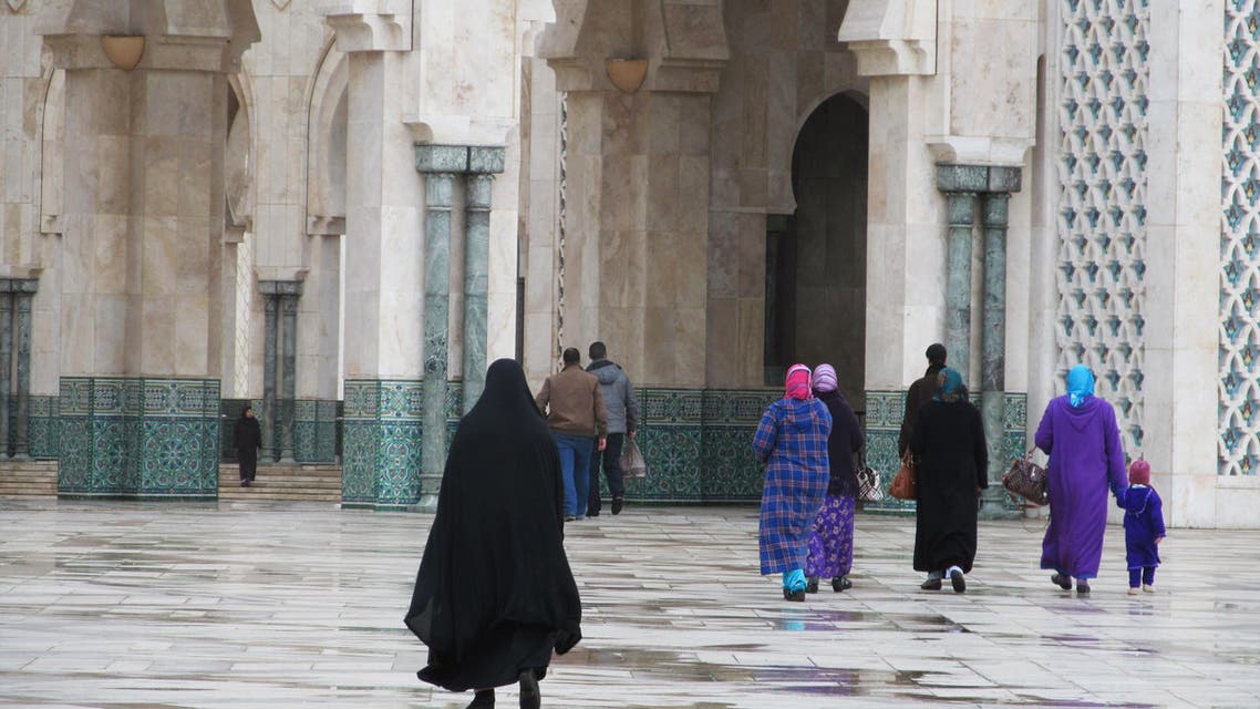 This January 2013 photo shows women about to enter Casablanca's monumental Hassan II mosque in Morocco.