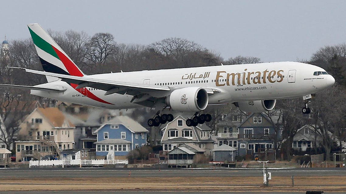 An Emirates Airlines Boeing 777 lands at Logan International Airport in Boston, Monday, March 10, 2014. Emirates Airlines launched daily service between Boston and Dubai on Monday afternoon. (AP Photo/Michael Dwyer)