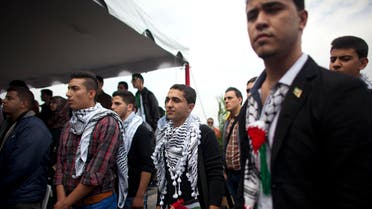 In this Nov. 6, 2014 file photo, Palestinian students attend a welcome ceremony at the Simon Bolivar airport in Maiquetia, Venezuela. AP