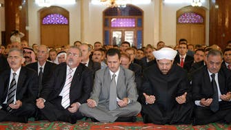 Syria’s Assad in rare public appearance for Muslim holiday 