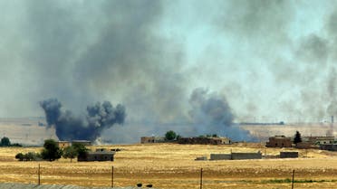 Syrian Kurdish fighters closed in on the outskirts of a strategic ISIS-held town on the Turkish border in June.a (AP)