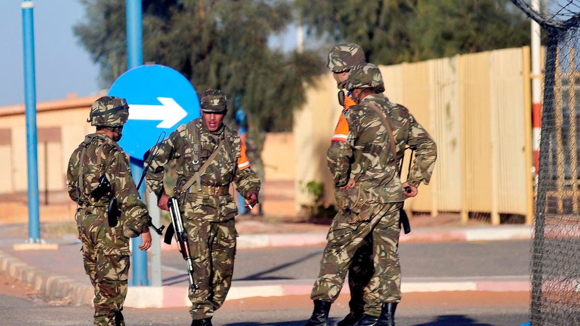 Algerian soldiers secure the airport in Ain Amenas, Algeria, before the departure of freed hostages Saturday, Jan. 19, 2013. AP