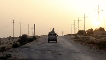 An Egyptian military vehicle is seen on the highway in northern Sinai, Egypt in this May 25, 2015 file photo. Reuters