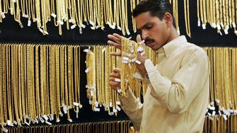 Gold price sinks to more than five-year low