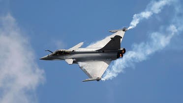 French Capt. Benoit Planche, nicknamed "Tao", performs with a Rafale single seat jet aircraft during its demonstration flight at the Paris Air Show, in Le Bourget airport, north of Paris, Friday, June 19, 2015. AP 