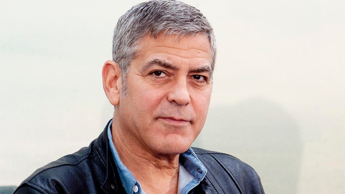 U.S actor George Clooney is seen during the press conference of the film 'Tomorrow Land' at Ciudad de las Artes y las Ciencias in Valencia, Spain on Tuesday, May 19, 2015. (AP Photo/Abraham Caro Marin)